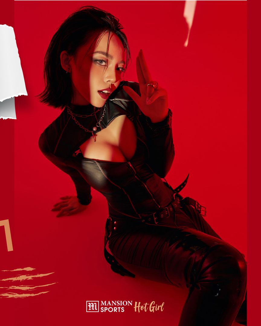 Phí Thanh Thảo in a black leather outfit against a red backdrop, with the Mansion Sports Hot Girl logo
